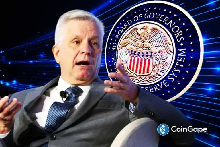 An image of Christopher Waller and to describe the Fed rate cut