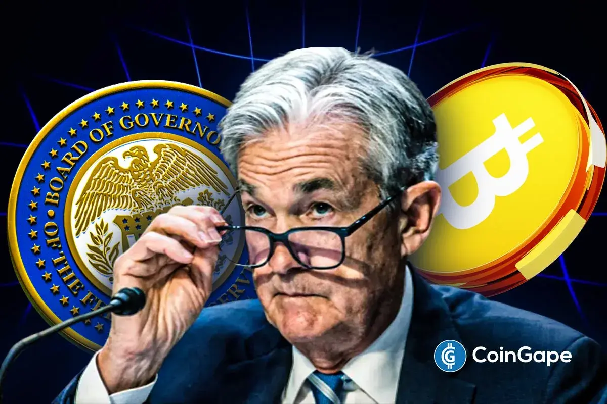An image of Jerome Powell and Bitcoin's logo