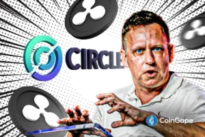 Peter Thiel gestures during discussion on Erebor crypto bank as Ripple and Circle await U.S. charter decisions.