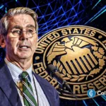Treasury Secretary Scott Bessent addresses new crypto ETF staking guidance beside the U.S. Federal Reserve emblem.
