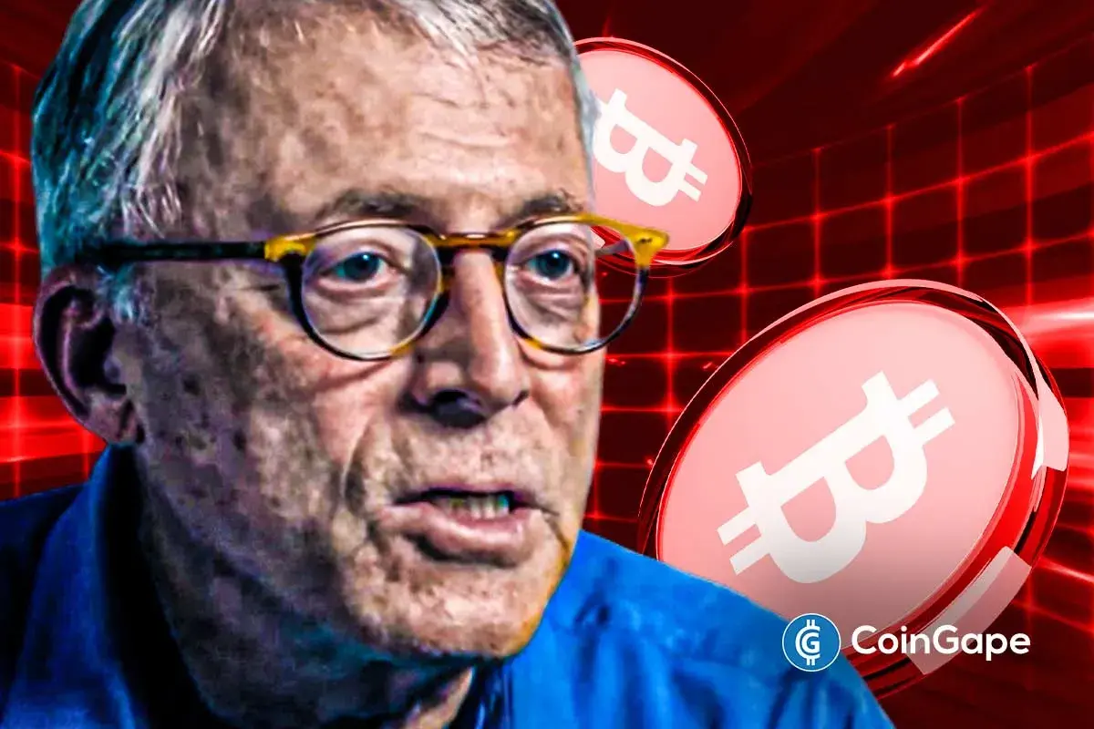 Veteran trader shown against falling Bitcoin graphics, illustrating his bearish market outlook and warning of deeper price declines.