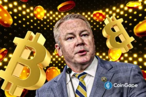 A U.S. lawmaker Rep. Warren Davidson shown in front of Bitcoin graphics as he proposes a national Bitcoin tax and strategic reserve policy.