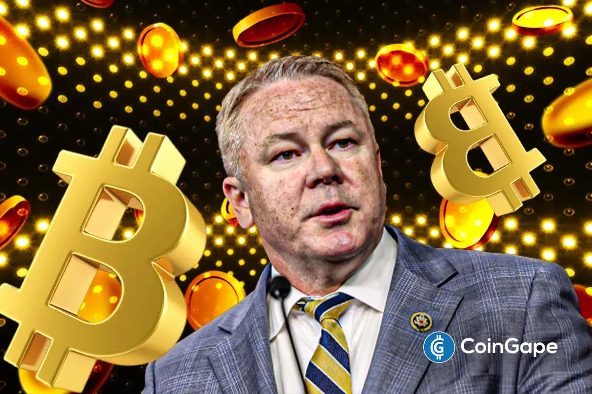 A U.S. lawmaker Rep. Warren Davidson shown in front of Bitcoin graphics as he proposes a national Bitcoin tax and strategic reserve policy.