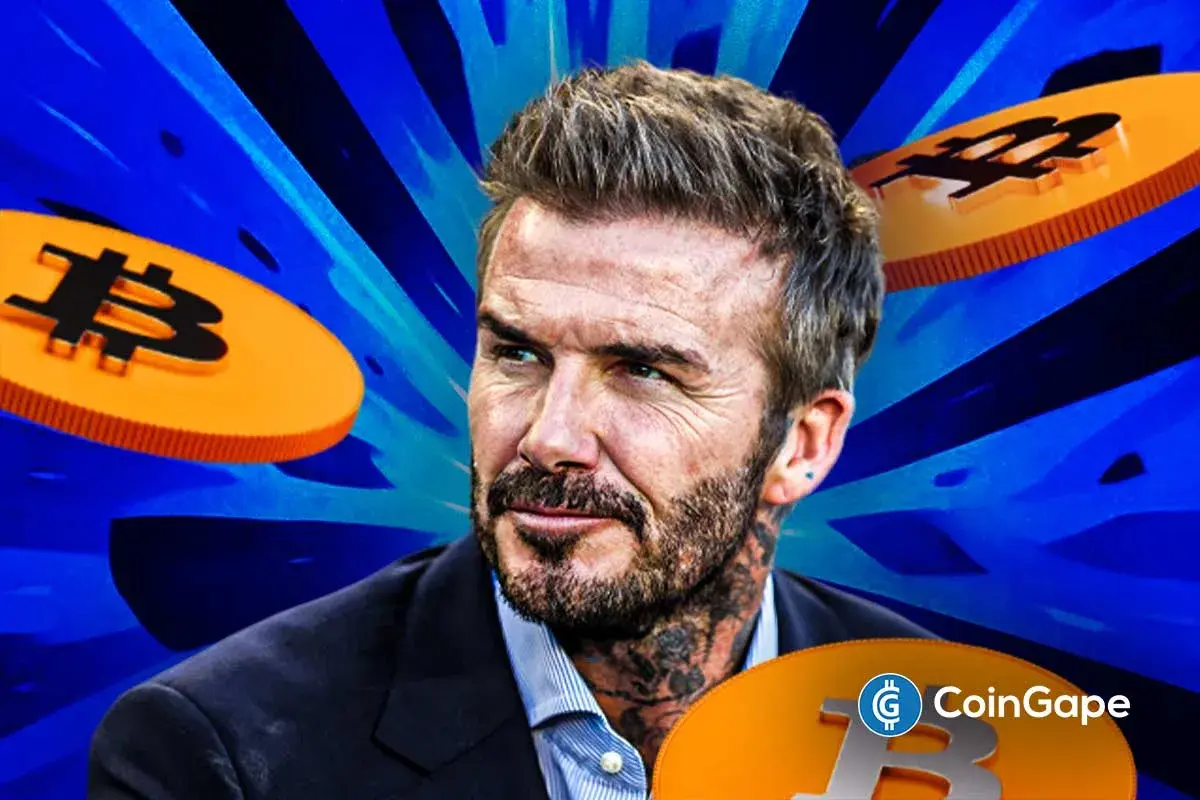David Beckham with Bitcoin symbols as Prenetics pauses its crypto treasury strategy amid market uncertainty.