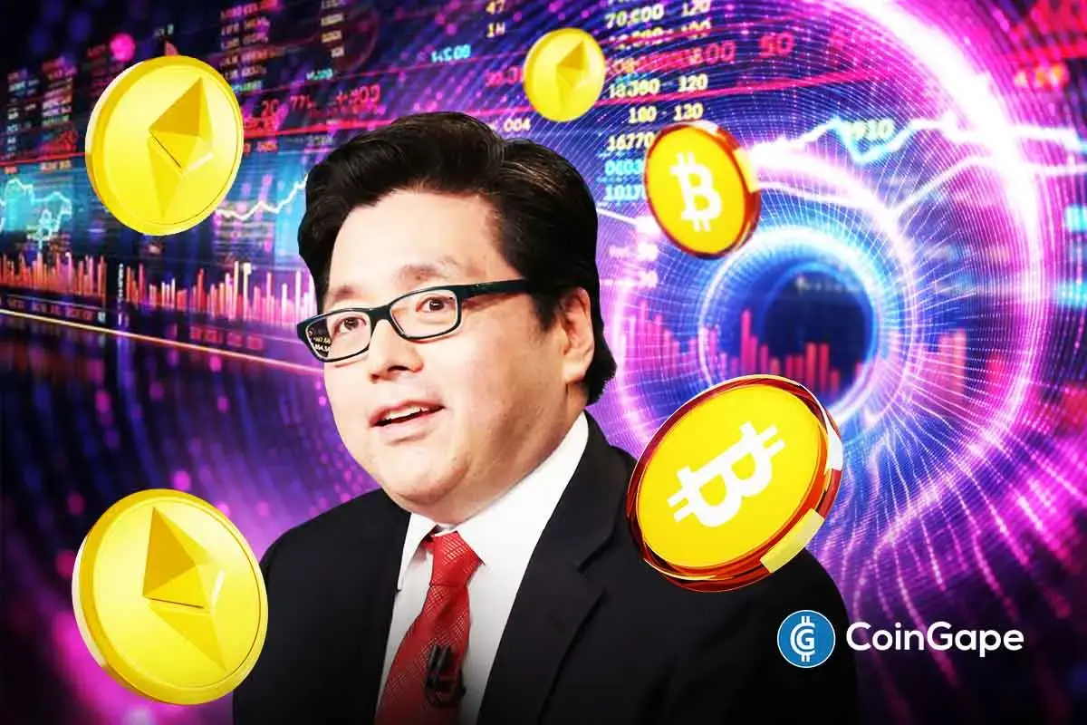 Tom Lee with Bitcoin and Ethereum graphics behind him as crypto markets react to shifting Fed and BOJ policy signals.