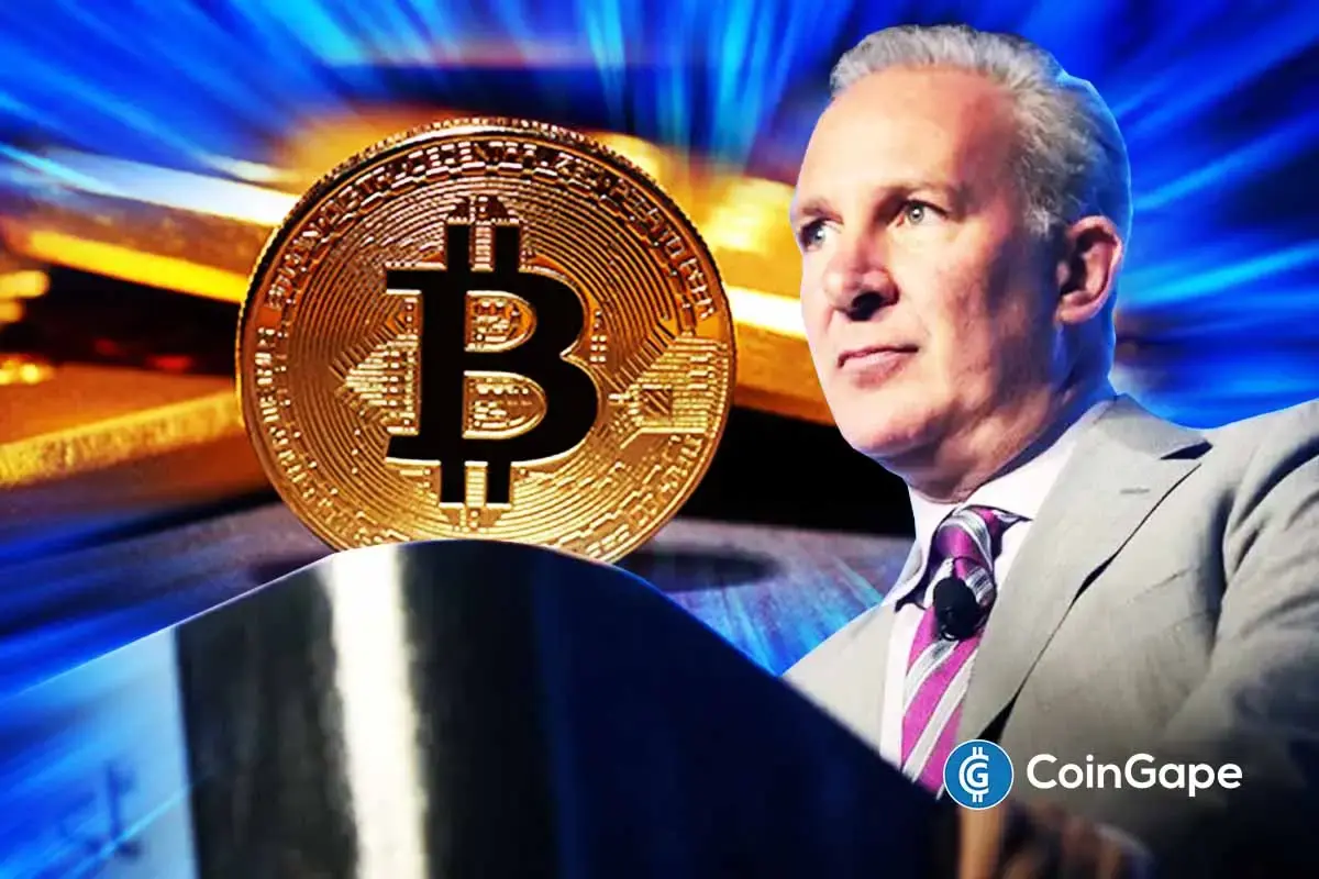 Peter Schiff speaks as Bitcoin and gold appear on screen, highlighting his criticism of crypto as a global reserve asset.