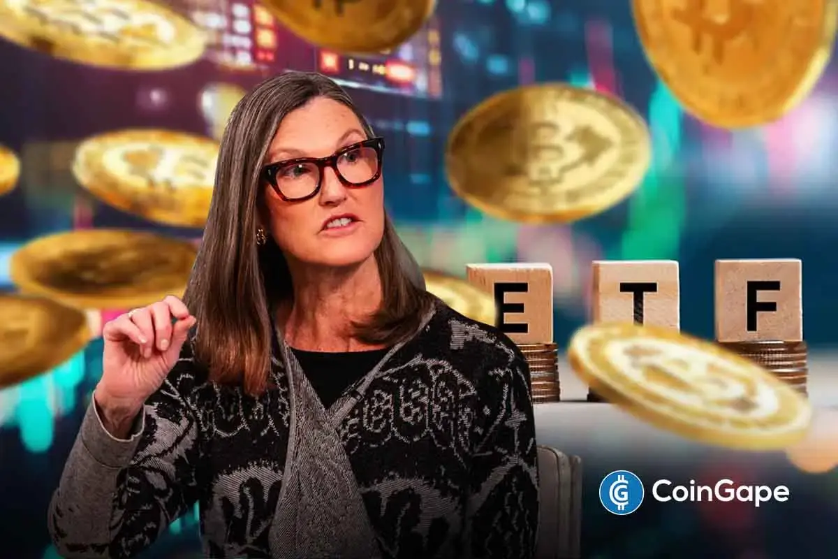 Cathie Wood speaks as Bitcoin and ETF graphics appear, highlighting ARK Invest’s latest crypto ETF filings.